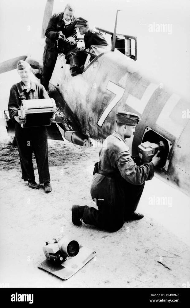 dinard-stmalo-france-luftwaffe-technician-slides-the-camera-into-a-BMXDN0