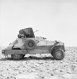 A_Marmon-Herrington_Mk_II_armoured_car_armed_with_an_Italian_Breda_20mm_gun,_near_Tobruk,_Libya,_8_May_1941._E2872