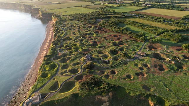 pointe-du-hoc-normandy-france-at-sunrise-air-2s-v0-dzp6htiguz491