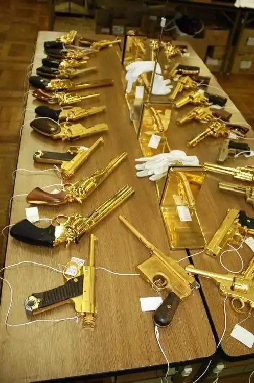 saddam-husseins-golden-gun-collection-v0-gq088822gz1a1 (1)