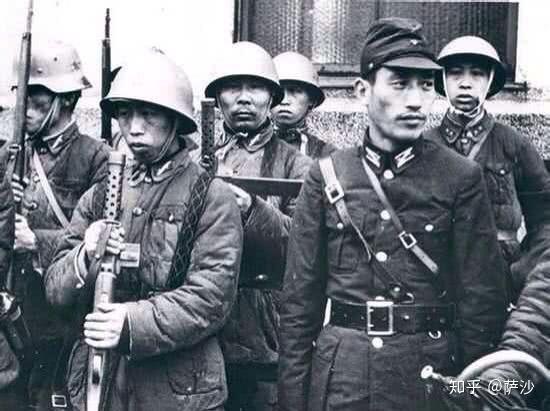 Chinese puppet troops with SMG and Japanese officer